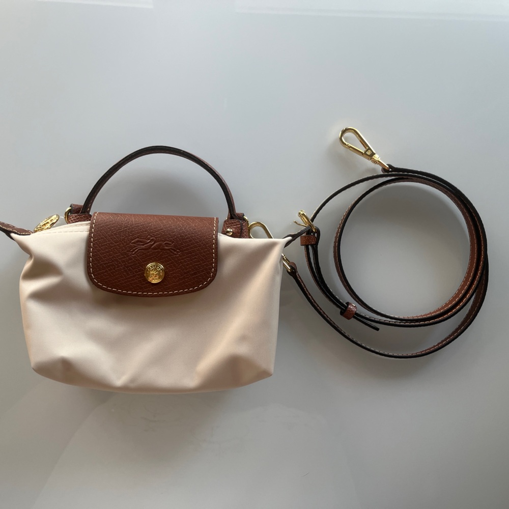 **SOLD** NWOT LE PLIAGE ORIGINAL POUCH WITH HANDLE
Paper - Recycled Canvas